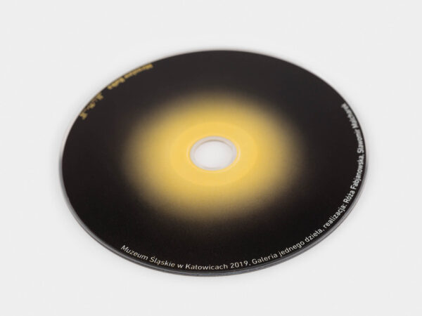 Płyta CD, kolor żółty stopniowo przechodzi w kolor czarny.