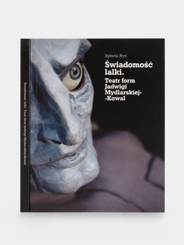 Katalog wystawy ,,Świadomość lalki. Teatr form Jadwigi Mydlarskiej-Kowal''. Na okładce fragment głowy kukiełki.